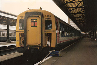 :usertrack:ttuse:320px-br_class_421_3_4-cig_emu_no._7355_portsmouth_harbour_24_october_1986.jpg